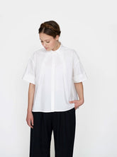 Load image into Gallery viewer, The Assembly Line Sewing Pattern. Model Wearing Front Pleat Shirt