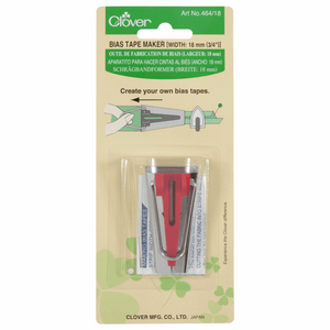 Metal and red plastic gadget for making 18mm bias binding tape by Clover. In branded green packaging