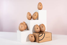 Load image into Gallery viewer, Socko mending egg display on white steps. Socko mending egg. Wooden Darning egg. White background. Sustainable Haberdashery. Sewing tools. Swiss darning. Mending. Glasgow