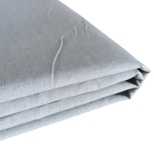 Load image into Gallery viewer, Grey organic cotton crossweave fabric folded view