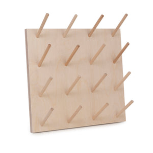 One size overlocker birch ply peg board for thread storage. Made by Laura ter Kuile for Bawn Textiles. 