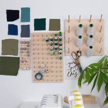 Load image into Gallery viewer, Range of birch ply peg boards on display and in use.