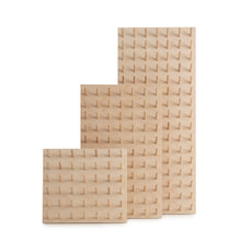 Load image into Gallery viewer, Various sizes of birch plywood peg boards made by Laura ter Kuile for Bawn Textiles. Wall mounted thread storage including overlocker cones.