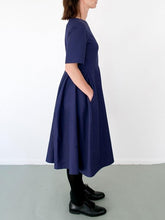 Load image into Gallery viewer, The Assembly Line Sewing Pattern. Model Wearing Tulip Dress