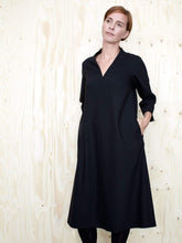 Load image into Gallery viewer, The Assembly Line Sewing Pattern. Model Wearing V-Neck Dress