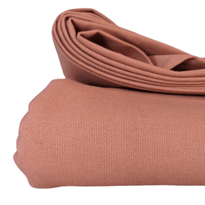 Lightweight cotton canvas fabric folded view coral colour