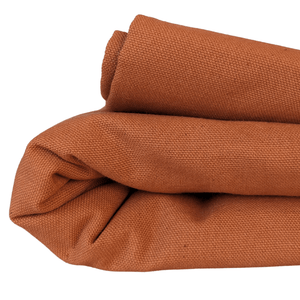 Lightweight cotton canvas fabric folded view orange colour