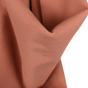 Lightweight cotton canvas fabric draped view coral colour