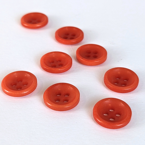 122 orange corozo button