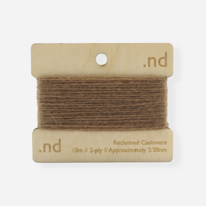 Dark Camel reclaimed / recycled 100% cashmere mending yarn. 10m wound horizontally onto bespoke laser cut and branded ply. Approximately 2/28nm. perfect weight for visible and invisible mending, darning and Swiss darning knitwear repairs. Made by Second Cashmere at Bawn Glasgow