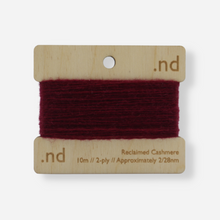 Load image into Gallery viewer, Burgundy reclaimed / recycled 100% cashmere mending yarn. 10m wound horizontally onto bespoke laser cut and branded ply. Approximately 2/28nm. perfect weight for visible and invisible mending, darning and Swiss darning knitwear repairs. Made by Second Cashmere at Bawn Glasgow
