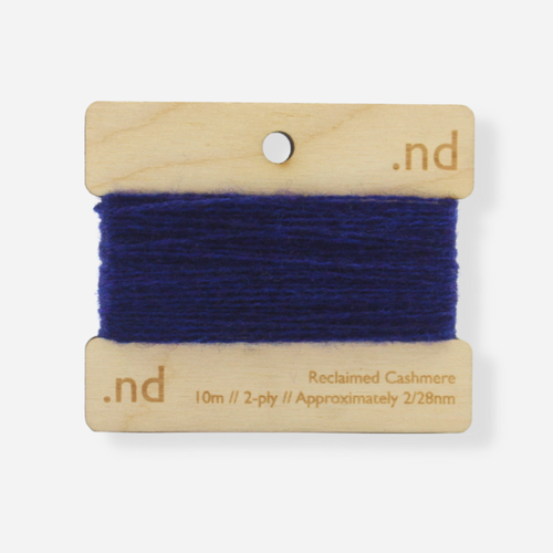 Dark Blue reclaimed / recycled 100% cashmere mending yarn. 10m wound horizontally onto bespoke laser cut and branded ply. Approximately 2/28nm. perfect weight for visible and invisible mending, darning and Swiss darning knitwear repairs. Made by Second Cashmere at Bawn Glasgow
