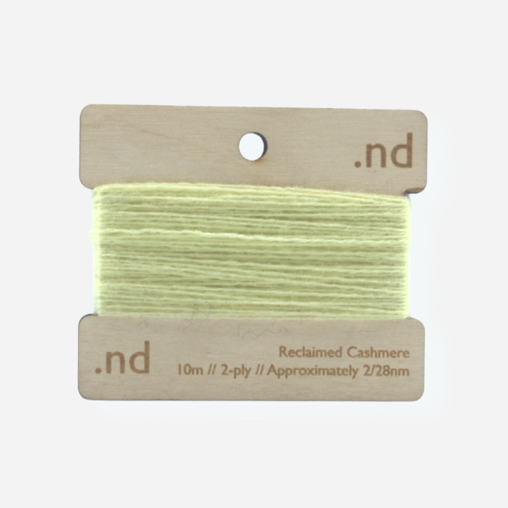 Lime Green reclaimed / recycled 100% cashmere mending yarn. 10m wound horizontally onto bespoke laser cut and branded ply. Approximately 2/28nm. perfect weight for visible and invisible mending, darning and Swiss darning knitwear repairs. Made by Second Cashmere at Bawn Glasgow