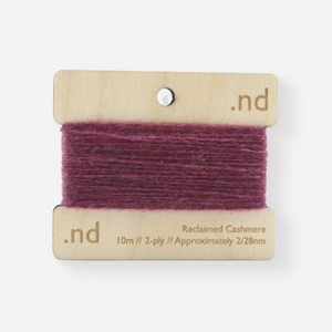 Grape Purple reclaimed / recycled 100% cashmere mending yarn. 10m wound horizontally onto bespoke laser cut and branded ply. Approximately 2/28nm. perfect weight for visible and invisible mending, darning and Swiss darning knitwear repairs. Made by Second Cashmere at Bawn Glasgow
