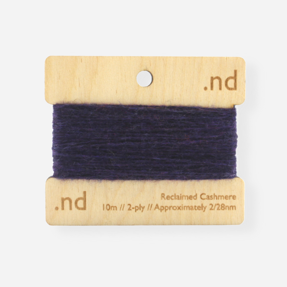 Dark Purple reclaimed / recycled 100% cashmere mending yarn. 10m wound horizontally onto bespoke laser cut and branded ply. Approximately 2/28nm. perfect weight for visible and invisible mending, darning and Swiss darning knitwear repairs. Made by Second Cashmere at Bawn Glasgow