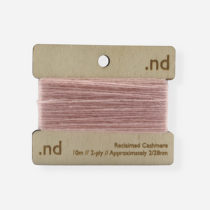 Light Pink reclaimed / recycled 100% cashmere mending yarn. 10m wound horizontally onto bespoke laser cut and branded ply. Approximately 2/28nm. perfect weight for visible and invisible mending, darning and Swiss darning knitwear repairs. Made by Second Cashmere at Bawn Glasgow