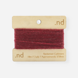 Rosewood Red reclaimed / recycled 100% cashmere mending yarn. 10m wound horizontally onto bespoke laser cut and branded ply. Approximately 2/28nm. perfect weight for visible and invisible mending, darning and Swiss darning knitwear repairs. Made by Second Cashmere at Bawn Glasgow