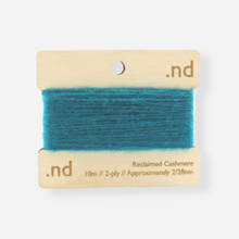 Load image into Gallery viewer, Teal reclaimed / recycled 100% cashmere mending yarn. 10m wound horizontally onto bespoke laser cut and branded ply. Approximately 2/28nm. perfect weight for visible and invisible mending, darning and Swiss darning knitwear repairs. Made by Second Cashmere at Bawn Glasgow
