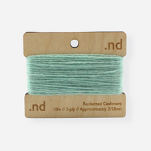 Load image into Gallery viewer, Mint green  reclaimed / recycled 100% cashmere mending yarn. 10m wound horizontally onto bespoke laser cut and branded ply. Approximately 2/28nm. perfect weight for visible and invisible mending, darning and Swiss darning knitwear repairs. Made by Second Cashmere at Bawn Glasgow

