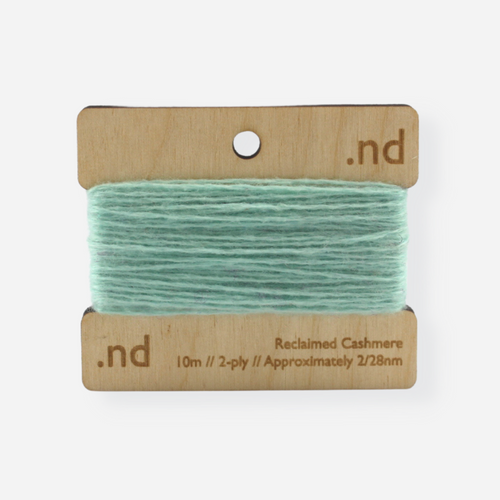 Mint green  reclaimed / recycled 100% cashmere mending yarn. 10m wound horizontally onto bespoke laser cut and branded ply. Approximately 2/28nm. perfect weight for visible and invisible mending, darning and Swiss darning knitwear repairs. Made by Second Cashmere at Bawn Glasgow