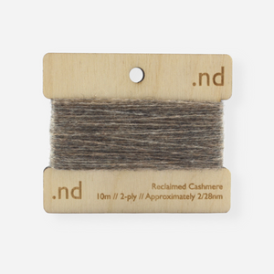 Grey Brown  reclaimed / recycled 100% cashmere mending yarn. 10m wound horizontally onto bespoke laser cut and branded ply. Approximately 2/28nm. perfect weight for visible and invisible mending, darning and Swiss darning knitwear repairs. Made by Second Cashmere at Bawn Glasgow