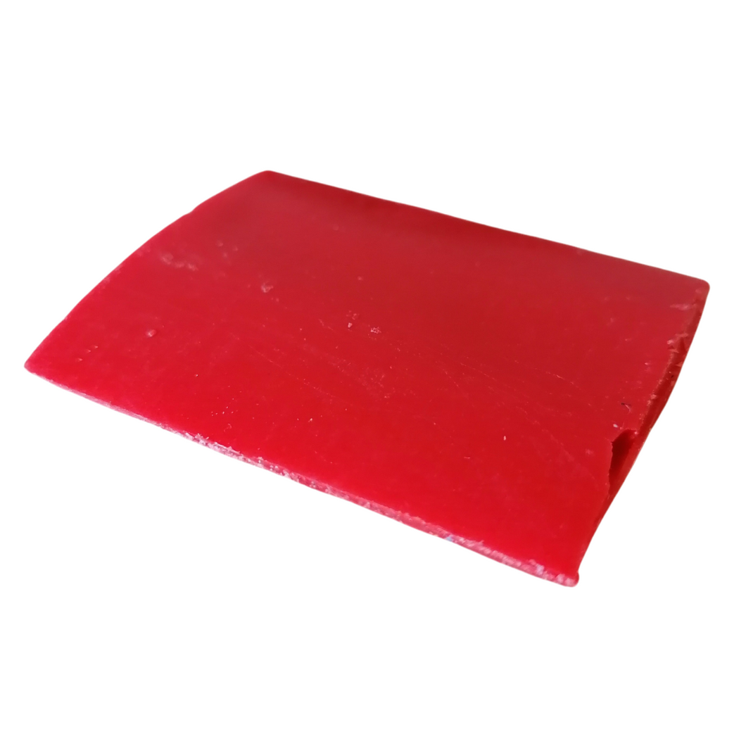 REd rectangle tailors wax on white background
