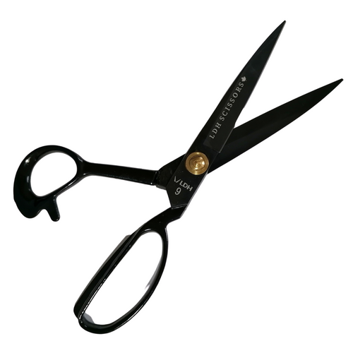 9 inch right handed fabric scissors in black, branded with LDH company logo. Open blade diagonal lay. 