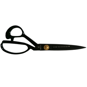 9 inch right handed fabric scissors in black, branded with LDH company logo. Open blade flat horizontal lay. 