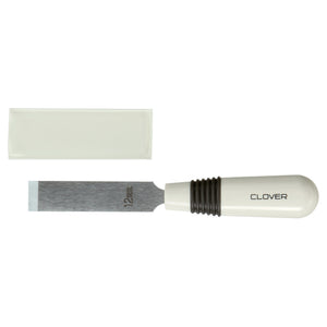 Flat lay 12mm buttonhole cutter blade with black and white handle and plastic guard by Clover on white background