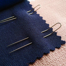 Load image into Gallery viewer, Two fork pins in use on blue tencel fabric. 
