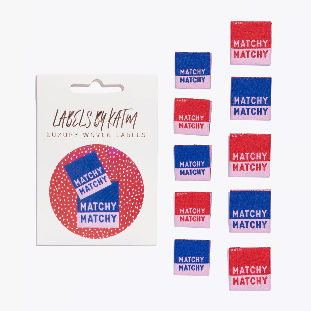 Flat Lay Kylie and the Machine Labels on white background - multiple colourful labels in paper sleeve saying:  Matchy Matchy